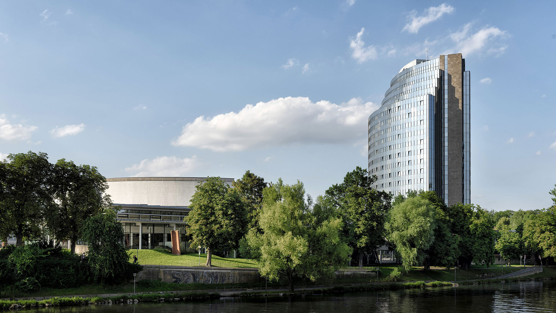 Maritim Hotel Ulm by the Danube, surrounded by greenery and modern architecture