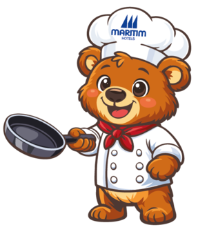 Cartoon bear in a chef outfit holding a frying pan and wearing a Maritim chef’s hat.