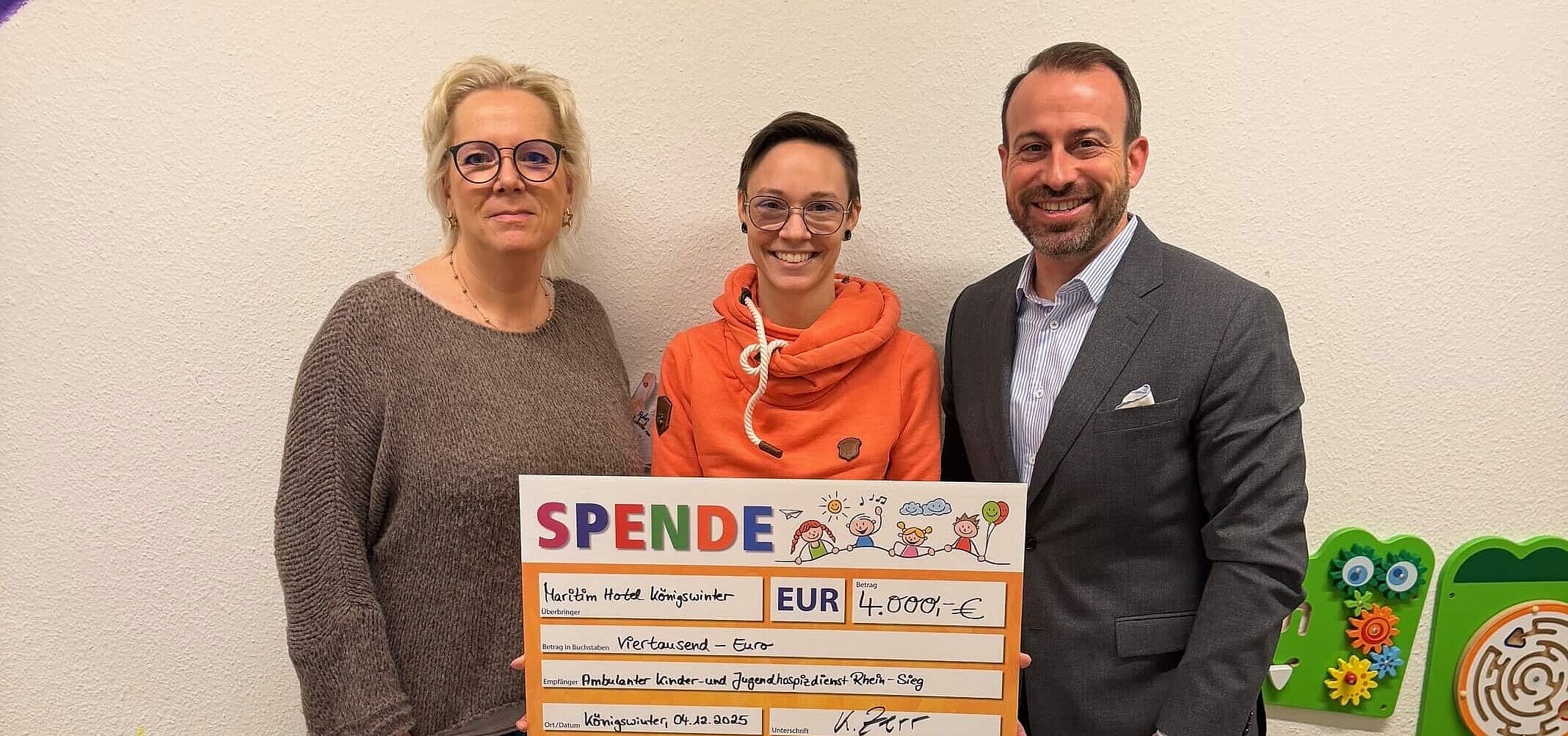 Remise d'un chèque par ProTomorrow à l'hospice pour enfants et adolescents Rhein-Sieg