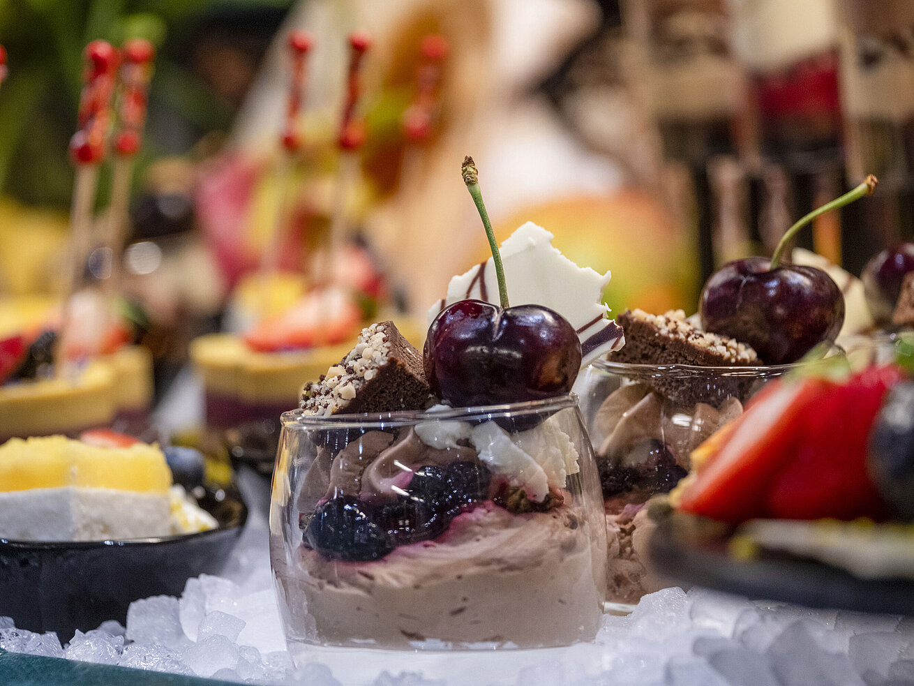 Dessert glass with chocolate mousse, cherry, and pastry at the Maritim proArte Hotel Berlin buffet for special moments.