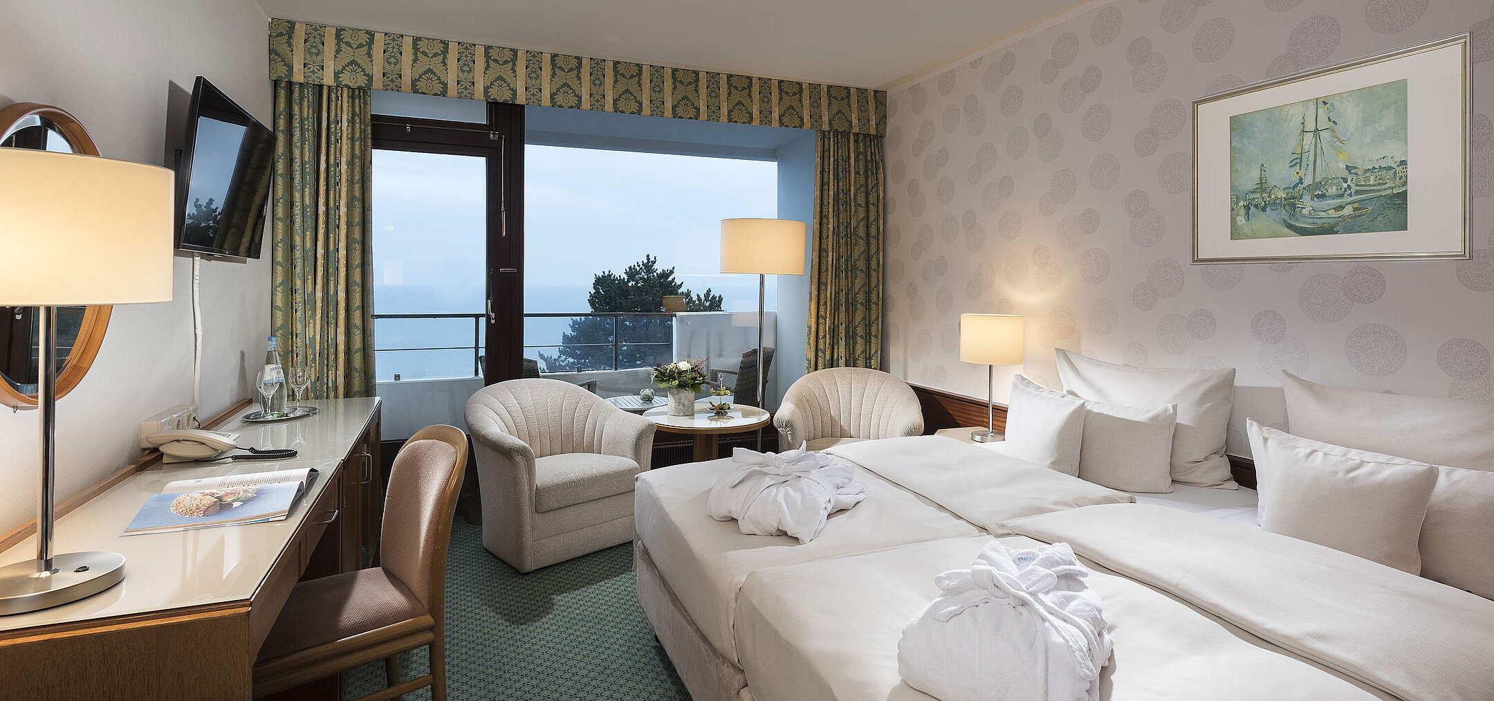 Superior room with sea view, double bed, and balcony at Maritim Seehotel Timmendorfer Strand.
