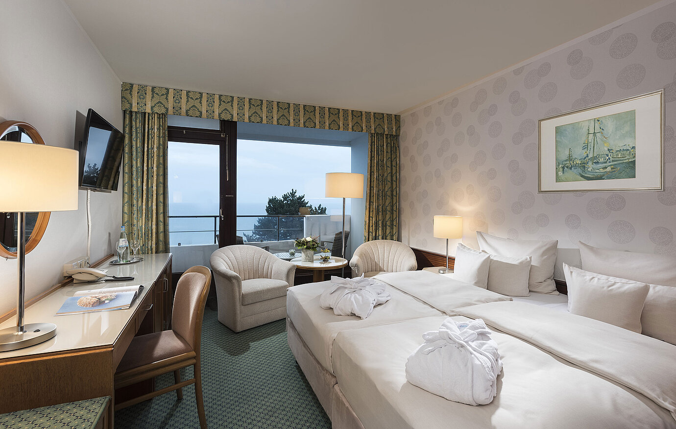 Superior room with sea view, double bed, and balcony at Maritim Seehotel Timmendorfer Strand.