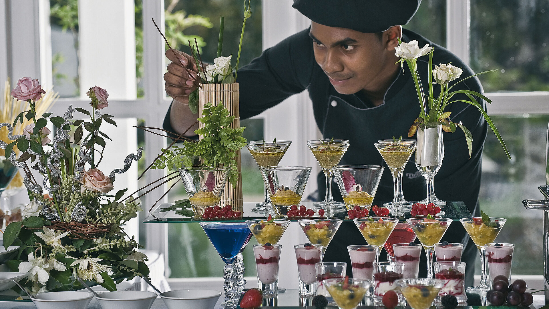 Château Mon Désir À-la-carte Fine Dining Restaurant Chef decorating artistic desserts and glasses at an elegant dessert buffet