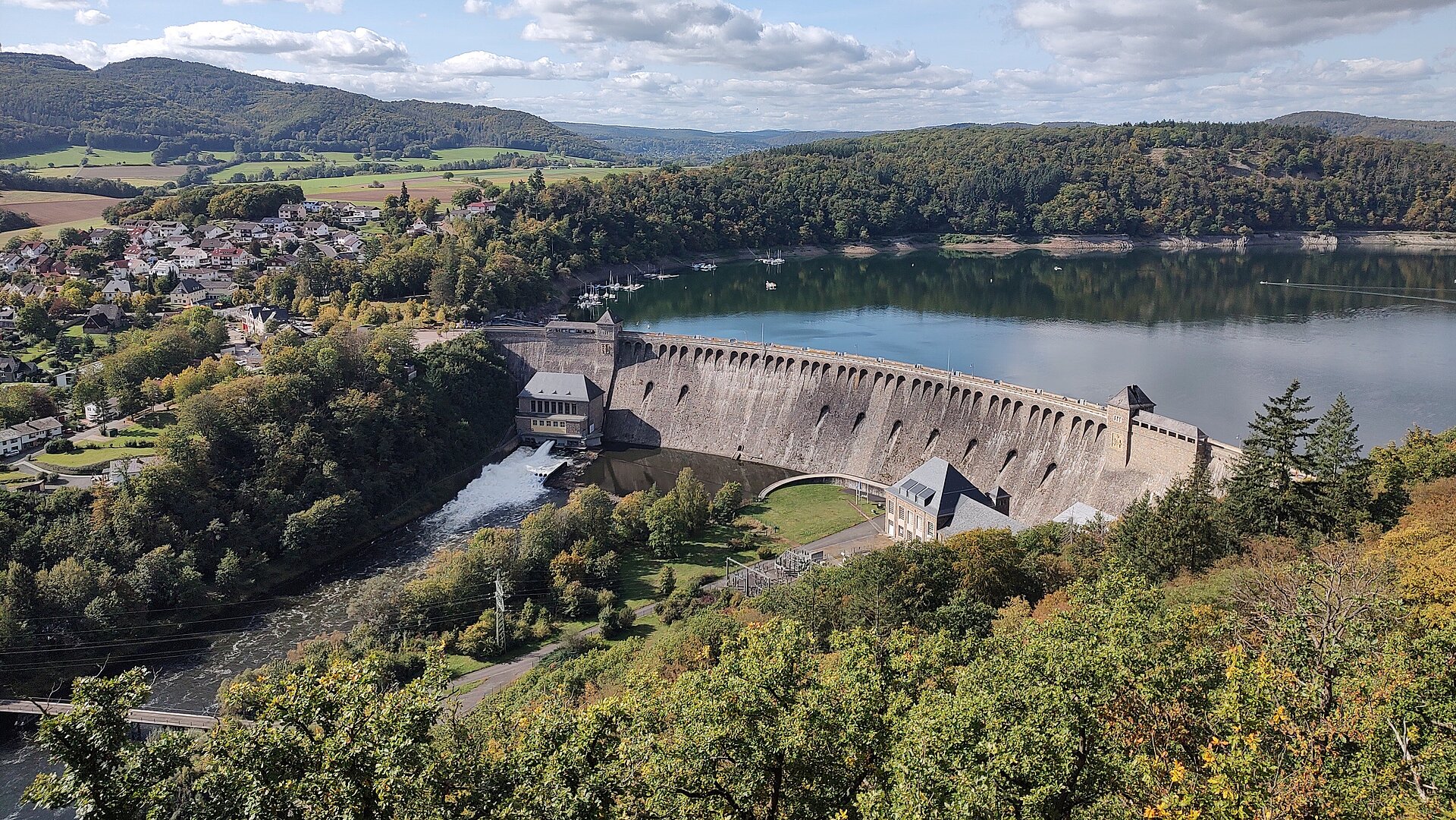 View of Eder Dam near Bad Wildungen with surrounding lake, forests and villages in the sunshine