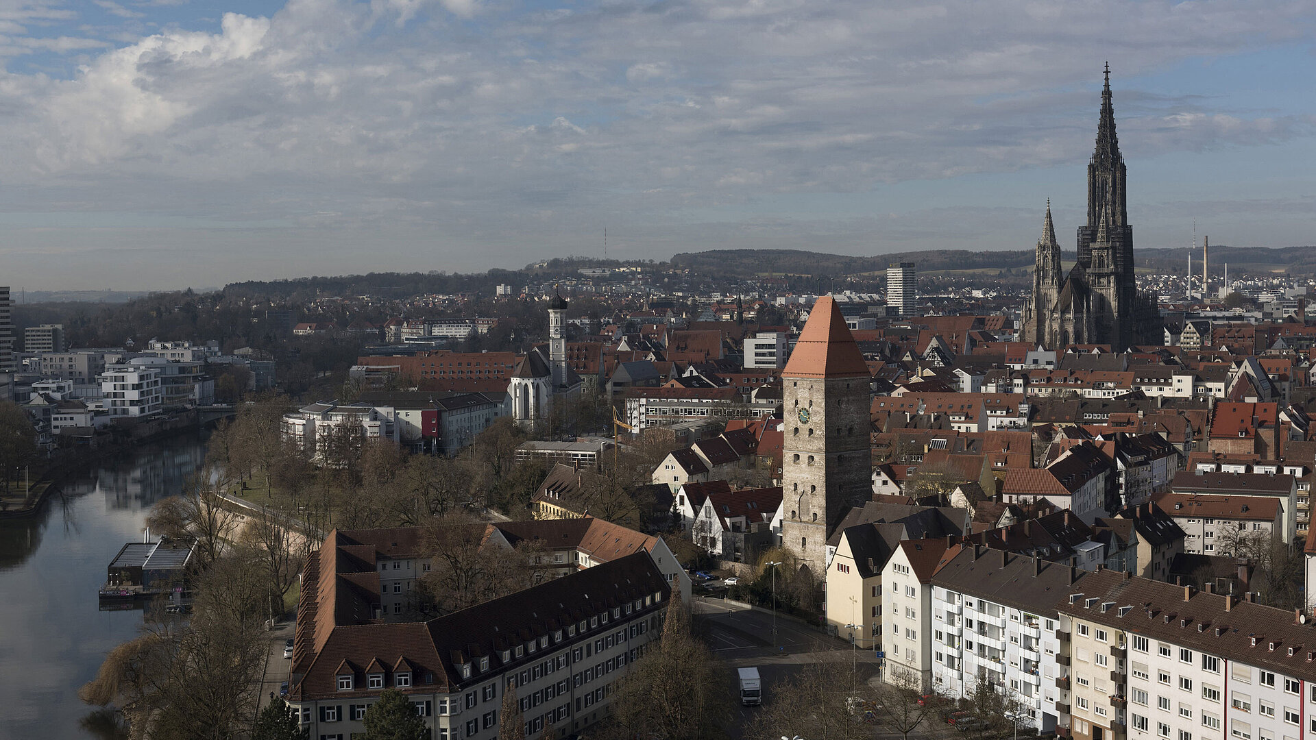 City view of Ulm with Danube, city tower and Ulm Minster in daylight.