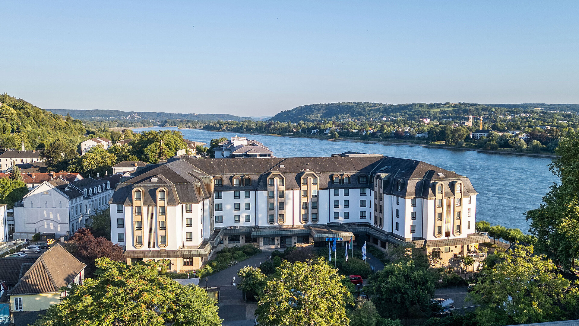 Exterior view Exterior view of Maritim Hotel Königswinter overlooking the River Rhine, the Rhine Valley and surrounding vineyards.