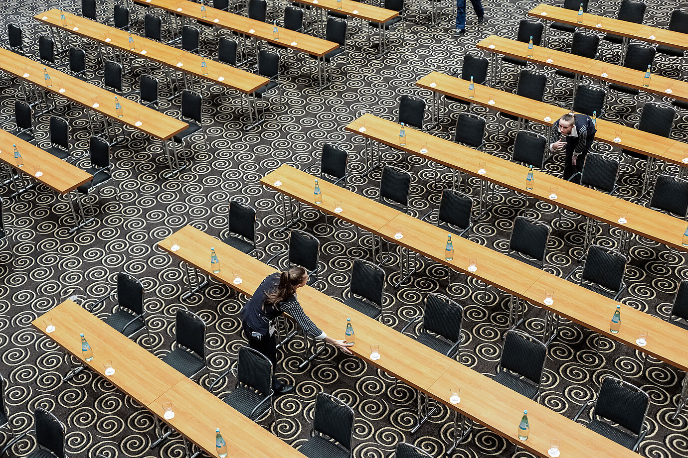 Preparing the conference room with water and glasses at Maritim Hotel Düsseldorf