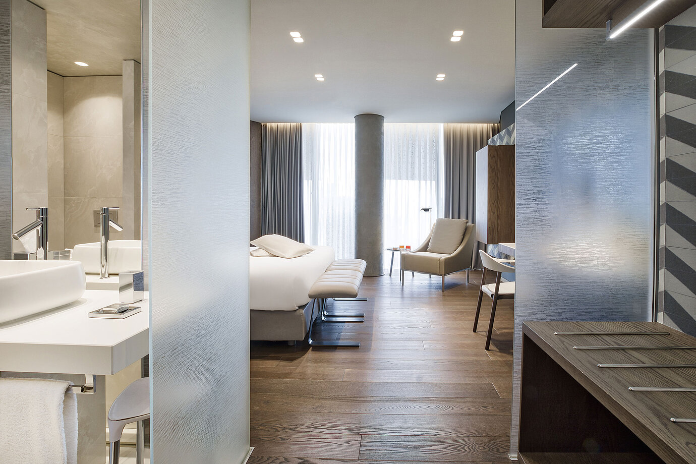 Bright modern room at Maritim Hotel Plaza Tirana with elegant design and wooden floor